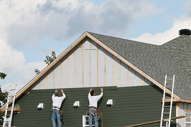 Professional Siding technician working in Lawrence, IN